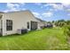 This well-maintained backyard features a spacious lawn, fenced perimeter, and serene views of neighboring properties at 1116 Arnott Ln, Matthews, NC 28105