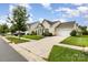 Inviting single-story home on a well-manicured lawn, showcasing a driveway and attached garage at 1116 Arnott Ln, Matthews, NC 28105