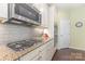 Gourmet kitchen featuring granite countertops, stainless steel appliances, and modern cabinetry at 1116 Arnott Ln, Matthews, NC 28105