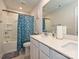 Bathroom with double sink, plenty of lighting, shower, and ample counter space at 11807 Midnight Way, Huntersville, NC 28078
