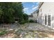 This lovely backyard features a wood deck and a stone fire pit area, perfect for entertaining at 12250 Wallace Ridge Dr, Charlotte, NC 28269