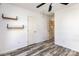 Bedroom with wood-look floors and access to an attic space at 12250 Wallace Ridge Dr, Charlotte, NC 28269