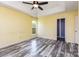 Bedroom with a ceiling fan and an ensuite bathroom at 12250 Wallace Ridge Dr, Charlotte, NC 28269