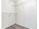 This walk-in closet is ready to be organized with provided shelving at 12250 Wallace Ridge Dr, Charlotte, NC 28269