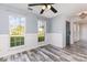 Bright living area features large windows and backyard views at 12250 Wallace Ridge Dr, Charlotte, NC 28269
