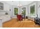 Cozy breakfast nook with natural light and a charming chandelier near the kitchen at 13101 Kensworth Ct, Charlotte, NC 28277