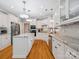 Spacious kitchen featuring stainless steel appliances, granite countertops, and a large center island at 13101 Kensworth Ct, Charlotte, NC 28277