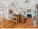 Inviting living room with vaulted ceiling, fireplace, and comfortable seating area at 13101 Kensworth Ct, Charlotte, NC 28277