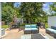 Backyard featuring a patio with outdoor dining and seating near detached storage and a grill at 13510 Brandon Trail Dr, Charlotte, NC 28213