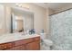 A full bath with a shower/tub combo and a vanity with drawers for storage at 13510 Brandon Trail Dr, Charlotte, NC 28213