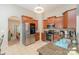 Spacious kitchen with stainless steel appliances, granite countertops, and warm wooden cabinetry at 13510 Brandon Trail Dr, Charlotte, NC 28213