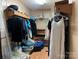 Walk-in closet filled with clothes and storage items at 1355 Oak Breeze Dr, Mooresville, NC 28115