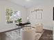 Cozy office with large window, stylish desk, and comfortable seating at 152 Riverstone Dr, Davidson, NC 28036
