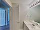 Well-lit bathroom featuring a sleek vanity, large mirror, and modern fixtures at 1703 Southwind Dr, Charlotte, NC 28216