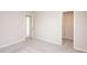 Bedroom featuring an open closet, neutral carpet, and neutral walls at 17718 Terryglass Ln, Charlotte, NC 28278