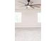 Neutral bedroom featuring a ceiling fan, two windows, neutral carpet, and light colored walls at 17718 Terryglass Ln, Charlotte, NC 28278