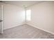 Comfortable bedroom with neutral carpeting, a bright window, and ample space at 17718 Terryglass Ln, Charlotte, NC 28278