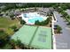 Overview of community amenities including a pool, sports courts, and clubhouse for residents at 17718 Terryglass Ln, Charlotte, NC 28278