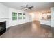 Inviting open living space with fireplace, hardwood floors and adjoined kitchen perfect for entertaining at 17718 Terryglass Ln, Charlotte, NC 28278
