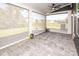 Covered patio with shades, offering views of the backyard and neighborhood at 17718 Terryglass Ln, Charlotte, NC 28278