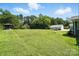 Expansive backyard with a gazebo and garage, surrounded by lush greenery and trees at 188 Gum Branch Rd # 3, Charlotte, NC 28214