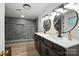 Bathroom with double sink vanity, modern decor, walk-in shower and neutral color palette at 188 Gum Branch Rd # 3, Charlotte, NC 28214