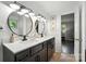 Bathroom features double vanity, contemporary lighting, modern fixtures and neutral decor at 188 Gum Branch Rd # 3, Charlotte, NC 28214
