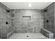 Modern tile shower with dual shower heads and bench seating at 188 Gum Branch Rd # 3, Charlotte, NC 28214