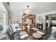 Open dining area with view of living area features modern decor and dark wood table and flooring at 188 Gum Branch Rd # 3, Charlotte, NC 28214