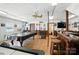 Spacious game room with a pool table, bar area, hardwood floors and plenty of space for activities at 188 Gum Branch Rd # 3, Charlotte, NC 28214