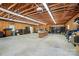 Spacious three-car garage featuring bare wood trusses and plenty of room for storage and projects at 188 Gum Branch Rd # 3, Charlotte, NC 28214