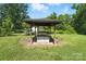 Outdoor gazebo with a grill, providing a perfect space for entertaining and outdoor cooking at 188 Gum Branch Rd # 3, Charlotte, NC 28214