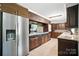 Well-equipped kitchen featuring stainless steel appliances and dark brown cabinetry at 188 Gum Branch Rd # 3, Charlotte, NC 28214