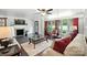 Comfortable living room with neutral colors, fireplace, and lots of natural light at 188 Gum Branch Rd # 3, Charlotte, NC 28214