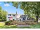 Inviting backyard featuring a spacious deck, lush landscaping, and picturesque views of the serene surroundings at 188 Ponderosa Cir, Mooresville, NC 28117