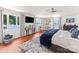 Spacious main bedroom with lake views, plush rug, and natural light at 188 Ponderosa Cir, Mooresville, NC 28117