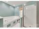 Inviting bathroom featuring bathtub and walk-in shower with window allowing for natural light at 2014 Steeplechase Dr, Rock Hill, SC 29732