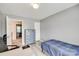 Well-lit bedroom with gray walls, wood-look flooring, and ample storage space for ultimate comfort at 2014 Steeplechase Dr, Rock Hill, SC 29732