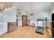 Spacious living room with hardwood floors, wainscotting, and chandelier at 2014 Steeplechase Dr, Rock Hill, SC 29732