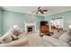 Comfortable living room with fireplace, neutral carpet, and soft aqua-painted walls at 2014 Steeplechase Dr, Rock Hill, SC 29732