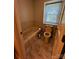 Bathroom with marble floors and wall trim, a white toilet, and bathtub at 204 Brentwood Dr, Maiden, NC 28650