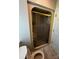 Small bathroom with a sliding door shower, toilet, and white walls at 204 Brentwood Dr, Maiden, NC 28650