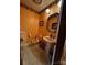 Bright half bathroom with pedestal sink, and beautiful decorative mirror at 204 Brentwood Dr, Maiden, NC 28650