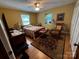 Light filled bedroom with a bed, bedside tables, carpet, and overhead fan at 204 Brentwood Dr, Maiden, NC 28650