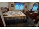 Charming bedroom featuring a wooden bed frame and a comfortable quilt at 204 Brentwood Dr, Maiden, NC 28650