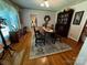 Elegant dining room with hardwood floors and ample natural light, ideal for entertaining guests at 204 Brentwood Dr, Maiden, NC 28650