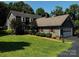 Charming two-story home with attached garage and lush green lawn, perfect for outdoor enjoyment at 204 Brentwood Dr, Maiden, NC 28650
