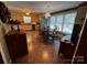 Cozy kitchen with stainless steel appliances and adjacent dining area, perfect for Gathering meals at 204 Brentwood Dr, Maiden, NC 28650