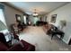 Spacious living room with neutral decor, natural light, and comfortable seating, creating a relaxing atmosphere at 204 Brentwood Dr, Maiden, NC 28650