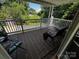 Inviting covered back porch with comfortable seating, perfect for relaxation and outdoor enjoyment at 204 Brentwood Dr, Maiden, NC 28650